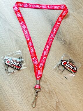 Raising Cane's Red Logo Lanyard with 2 Raising Cane’s Keychains bundle NEW